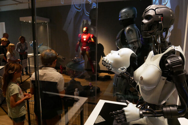 Kids enjoying the Robot Touring exhibition from the Movie Magic